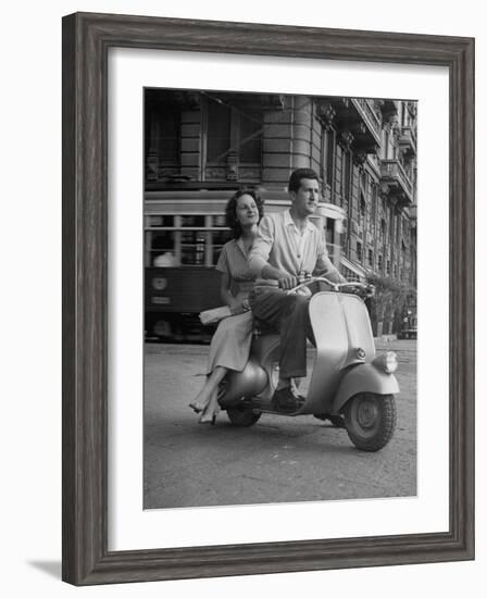 Man and Woman Riding a Vespa Scooter-Dmitri Kessel-Framed Photographic Print