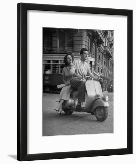 Man and Woman Riding a Vespa Scooter-Dmitri Kessel-Framed Photographic Print