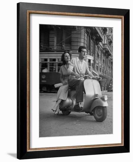 Man and Woman Riding a Vespa Scooter-Dmitri Kessel-Framed Photographic Print