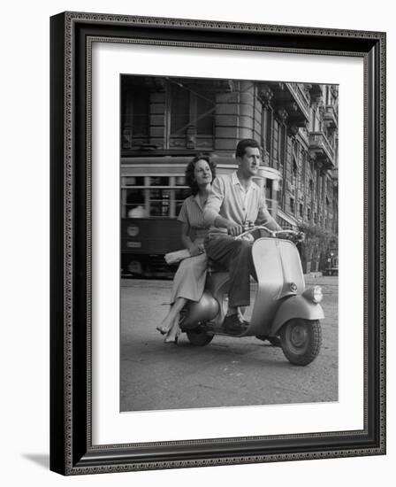 Man and Woman Riding a Vespa Scooter-Dmitri Kessel-Framed Photographic Print