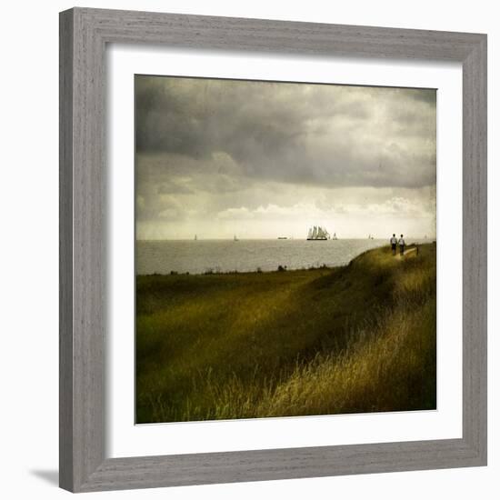 Man and Woman Walking Along a Path by the Sea with Tall Ships-Luis Beltran-Framed Photographic Print