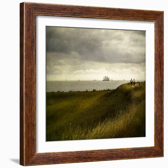 Man and Woman Walking Along a Path by the Sea with Tall Ships-Luis Beltran-Framed Photographic Print
