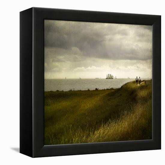 Man and Woman Walking Along a Path by the Sea with Tall Ships-Luis Beltran-Framed Premier Image Canvas