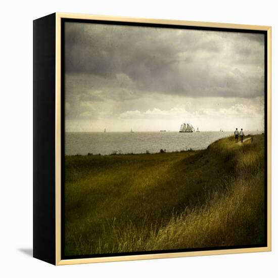 Man and Woman Walking Along a Path by the Sea with Tall Ships-Luis Beltran-Framed Premier Image Canvas