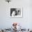 Man Bending over a Piece of Paper on His Dresser and Holding His Head-null-Framed Photo displayed on a wall