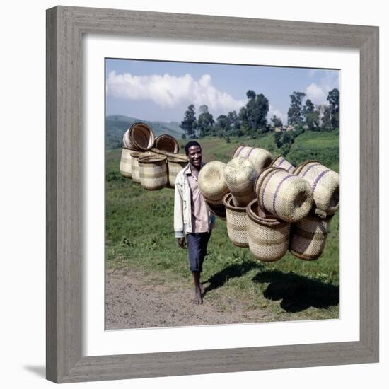 Man Carries Traditional Split-Bamboo Baskets to Sell at Kisoro Market, Southwest Uganda-Nigel Pavitt-Framed Photographic Print