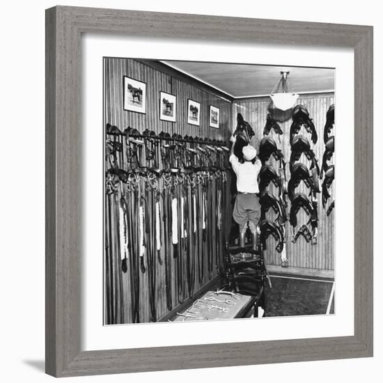 Man Checking Equipment Inside a Stable's Tack Room-Alfred Eisenstaedt-Framed Photographic Print