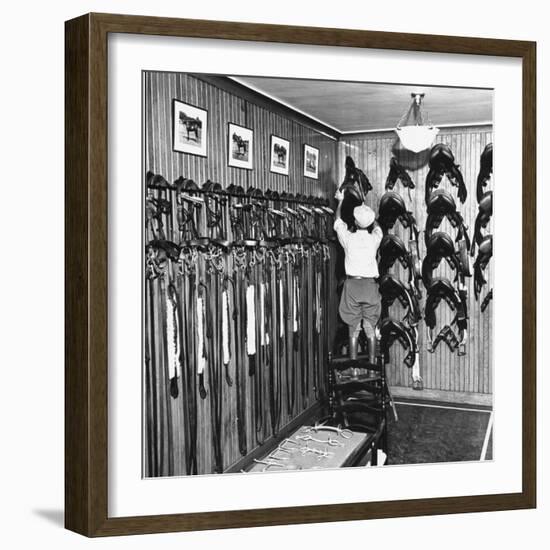 Man Checking Equipment Inside a Stable's Tack Room-Alfred Eisenstaedt-Framed Photographic Print