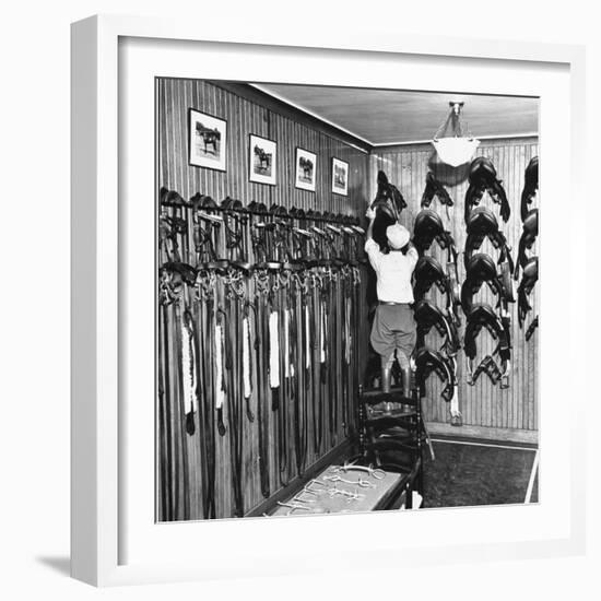 Man Checking Equipment Inside a Stable's Tack Room-Alfred Eisenstaedt-Framed Photographic Print