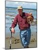 Man Crabbing and Digging for Razor Clams in Sand, Queen Charlotte Islands, Canada-Savanah Stewart-Mounted Photographic Print