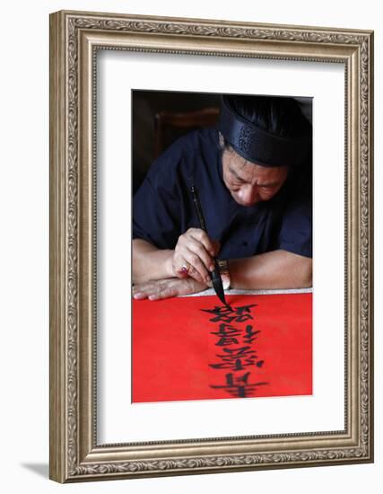 Man doing traditional Chinese writing (calligraphy) in ink using a brush, The Temple of Literature-Godong-Framed Photographic Print