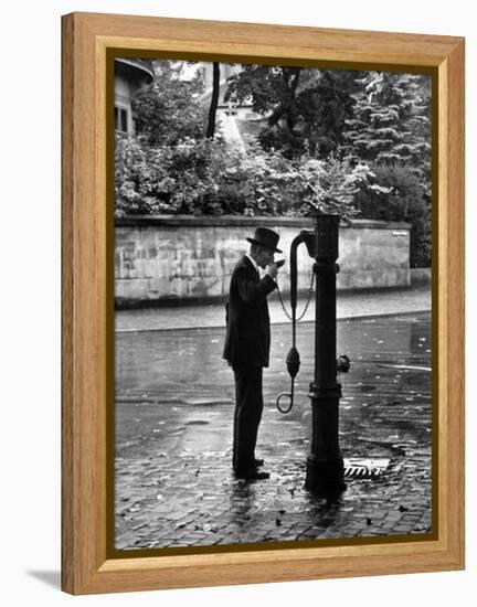 Man Drinking Water at Well Pump-Alfred Eisenstaedt-Framed Premier Image Canvas