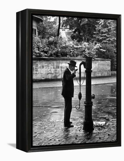 Man Drinking Water at Well Pump-Alfred Eisenstaedt-Framed Premier Image Canvas