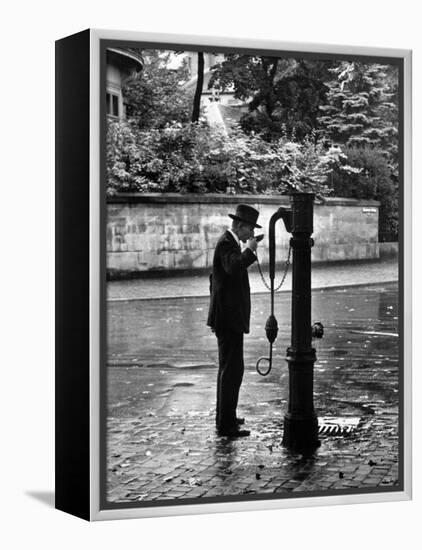 Man Drinking Water at Well Pump-Alfred Eisenstaedt-Framed Premier Image Canvas