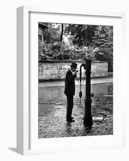 Man Drinking Water at Well Pump-Alfred Eisenstaedt-Framed Photographic Print