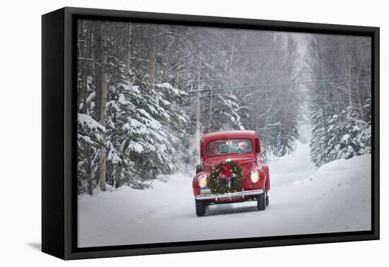 Man Driving A Vintage 1941 Ford Pickup With A Christmas Wreath On The Front During Winter-Design Pics-Framed Premier Image Canvas