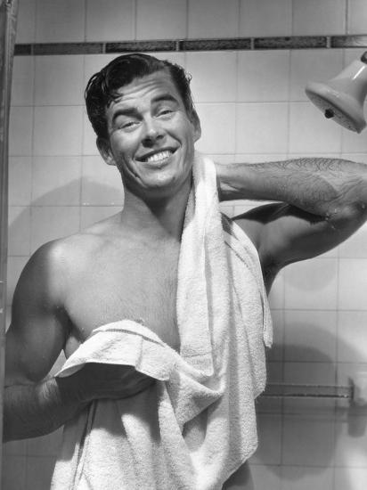 man drying off with