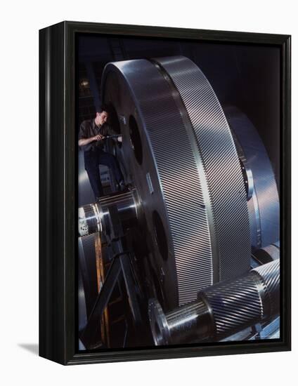 Man Dwarfed by Gigantic Gears He is Working on for the Navy, at General Electric Plant in US-Dmitri Kessel-Framed Premier Image Canvas