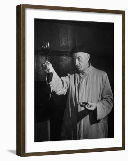 Man Examining the Clearness of the Wine and Decides it Will Be a Good Year-null-Framed Premium Photographic Print