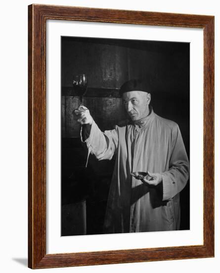 Man Examining the Clearness of the Wine and Decides it Will Be a Good Year-null-Framed Premium Photographic Print