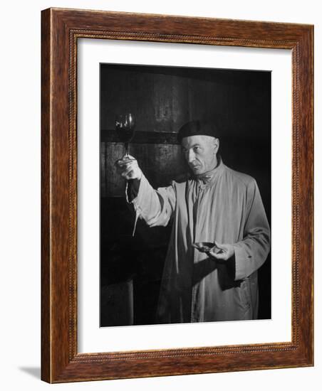 Man Examining the Clearness of the Wine and Decides it Will Be a Good Year-null-Framed Photographic Print