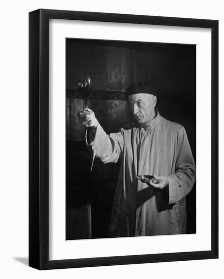 Man Examining the Clearness of the Wine and Decides it Will Be a Good Year-null-Framed Photographic Print