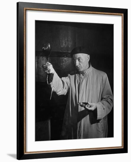 Man Examining the Clearness of the Wine and Decides it Will Be a Good Year-null-Framed Photographic Print