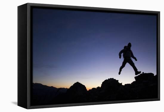 Man Exploring Mt. Rainier National Park, WA-Justin Bailie-Framed Premier Image Canvas