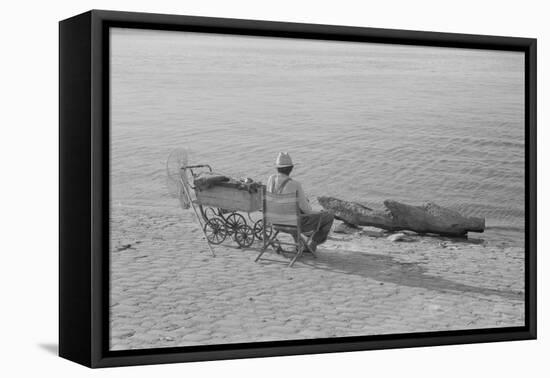 Man Fishing Along Ohio River, Louisville, Kentucky, 1940 (b/w photo)-Marion Post Wolcott-Framed Premier Image Canvas