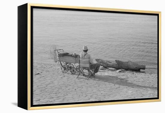 Man Fishing Along Ohio River, Louisville, Kentucky, 1940 (b/w photo)-Marion Post Wolcott-Framed Premier Image Canvas