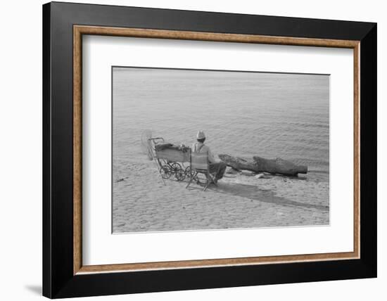 Man Fishing Along Ohio River, Louisville, Kentucky, 1940 (b/w photo)-Marion Post Wolcott-Framed Photographic Print