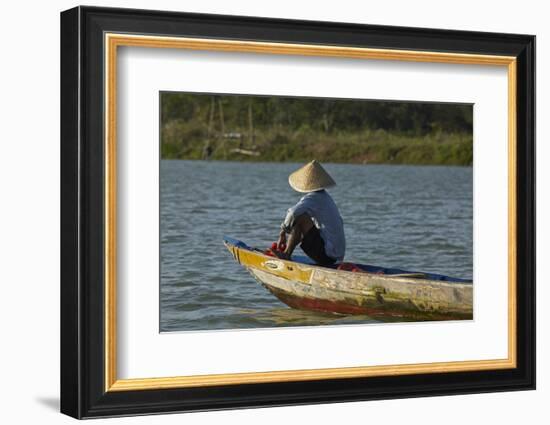 Man fishing from boat on Thu Bon River, Hoi An, Vietnam-David Wall-Framed Photographic Print