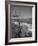 Man Fishing Off Montauk Point. Montauk Lighthouse Visible in Background-Alfred Eisenstaedt-Framed Photographic Print