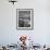 Man Fishing Off Montauk Point. Montauk Lighthouse Visible in Background-Alfred Eisenstaedt-Framed Photographic Print displayed on a wall