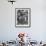 Man Fixing Basket on Bicycle as Children Watch Attentively-Nina Leen-Framed Photographic Print displayed on a wall