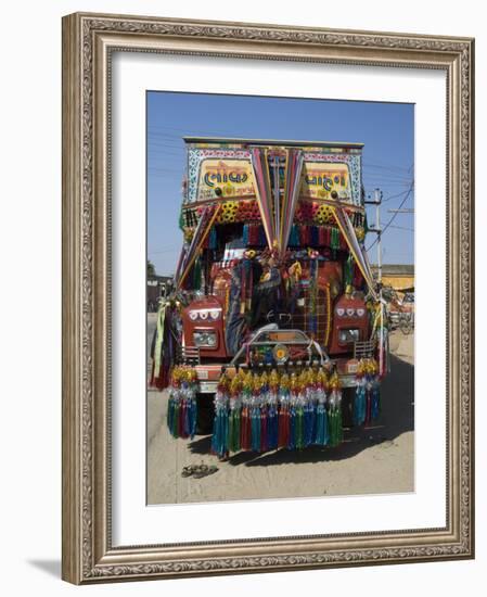 Man Fixing Decoration onto Truck for Diwali Celebrations, Pali District, Rajasthan, India, Asia-Annie Owen-Framed Photographic Print