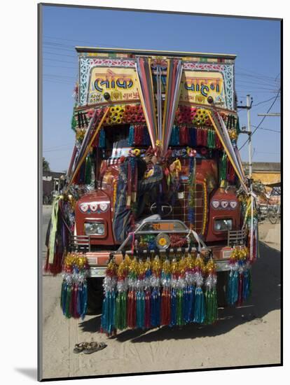Man Fixing Decoration onto Truck for Diwali Celebrations, Pali District, Rajasthan, India, Asia-Annie Owen-Mounted Photographic Print
