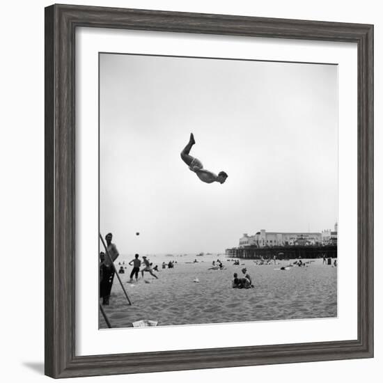 Man Flying Off a Trampoline at Santa Monica Beach-Loomis Dean-Framed Photographic Print