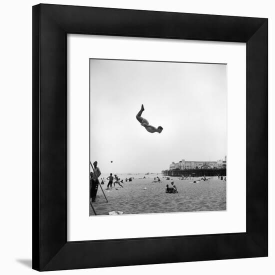 Man Flying Off a Trampoline at Santa Monica Beach-Loomis Dean-Framed Photographic Print