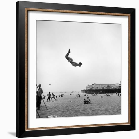 Man Flying Off a Trampoline at Santa Monica Beach-Loomis Dean-Framed Photographic Print