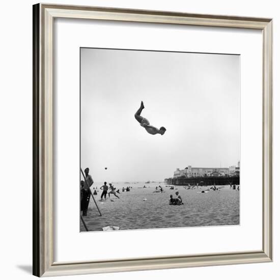 Man Flying Off a Trampoline at Santa Monica Beach-Loomis Dean-Framed Photographic Print