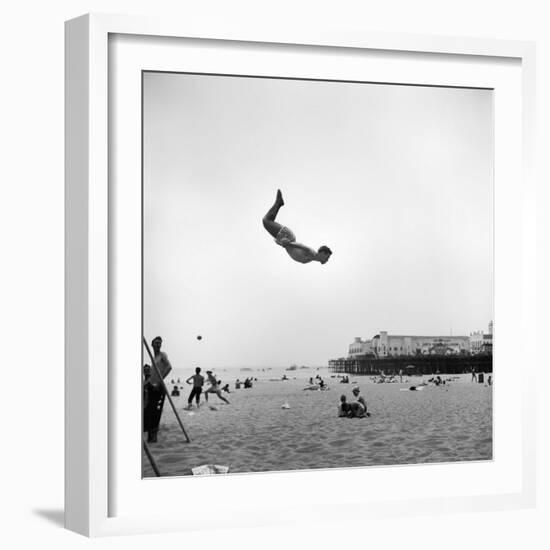 Man Flying Off a Trampoline at Santa Monica Beach-Loomis Dean-Framed Photographic Print