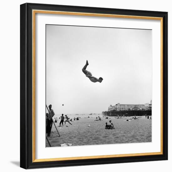 Man Flying Off a Trampoline at Santa Monica Beach-Loomis Dean-Framed Photographic Print