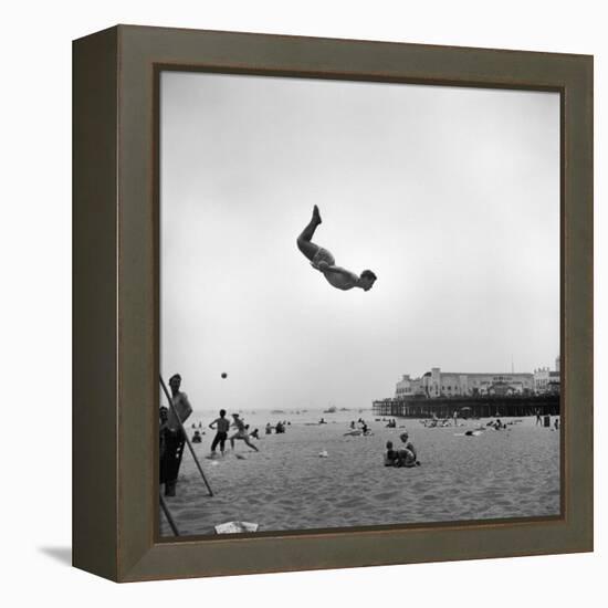 Man Flying Off a Trampoline at Santa Monica Beach-Loomis Dean-Framed Premier Image Canvas