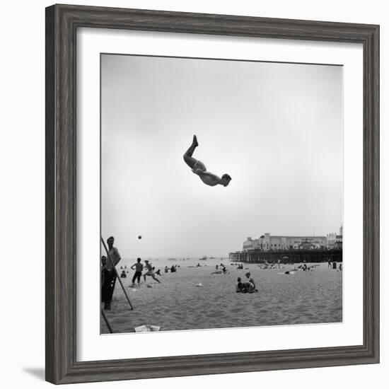 Man Flying Off a Trampoline at Santa Monica Beach-Loomis Dean-Framed Photographic Print