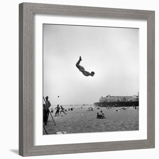 Man Flying Off a Trampoline at Santa Monica Beach-Loomis Dean-Framed Photographic Print