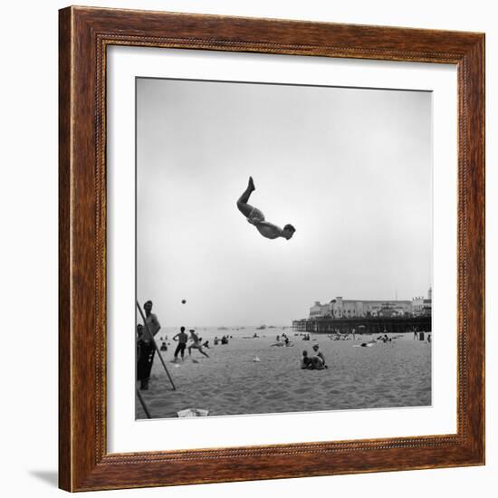 Man Flying Off a Trampoline at Santa Monica Beach-Loomis Dean-Framed Photographic Print