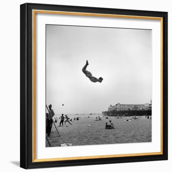 Man Flying Off a Trampoline at Santa Monica Beach-Loomis Dean-Framed Photographic Print