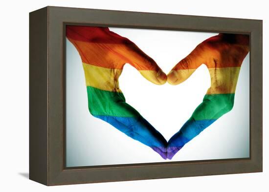 Man Hands Painted As The Rainbow Flag Forming A Heart, Symbolizing Gay Love-nito-Framed Stretched Canvas