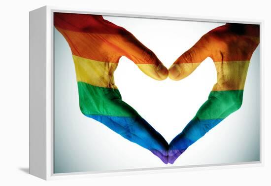 Man Hands Painted As The Rainbow Flag Forming A Heart, Symbolizing Gay Love-nito-Framed Stretched Canvas